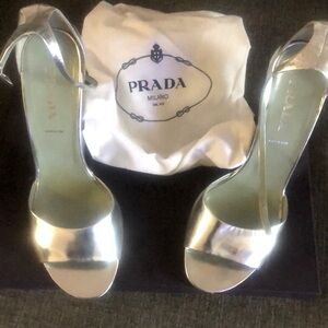 Prada Mettalic silver platforms, great condition and very sexy.
